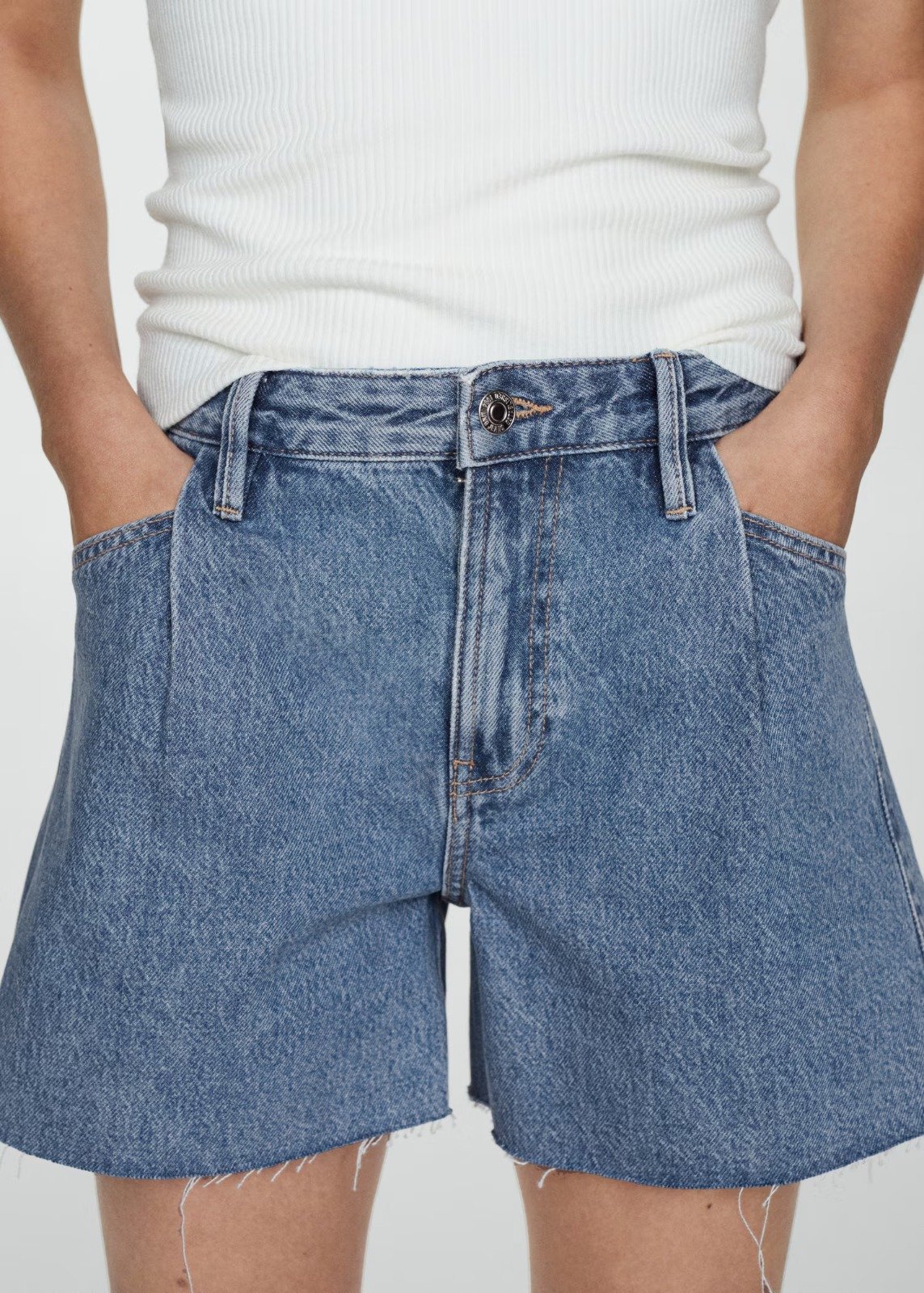 Denim shorts with frayed hem